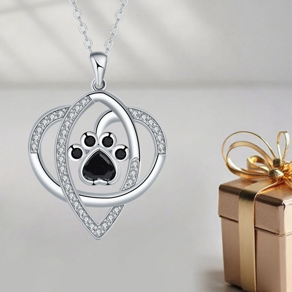 Copper pendant necklace with dogs and cats paw print design on cross chain