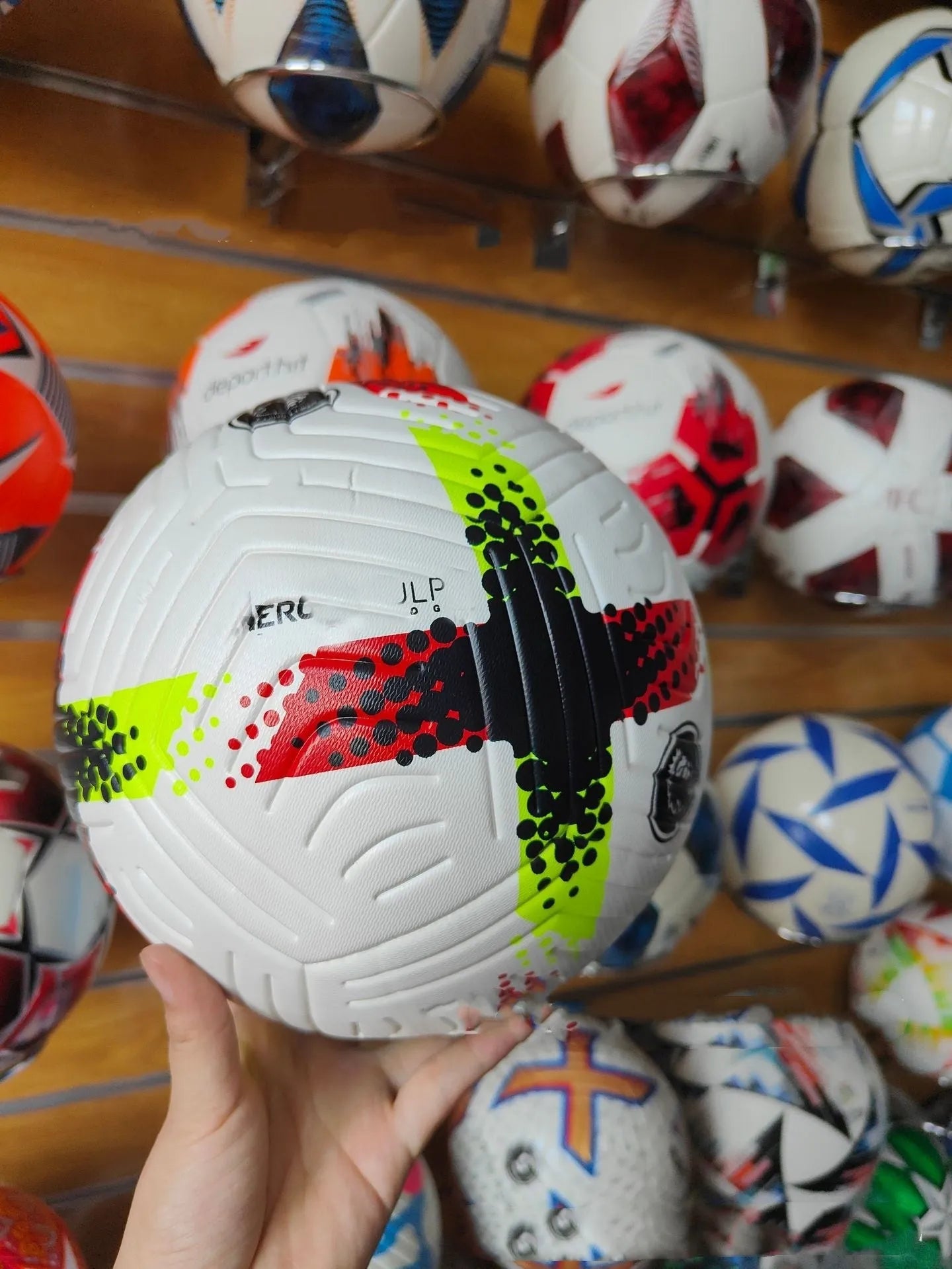 Fluorescent green size 5 training football with seamless thermal adhesive construction
