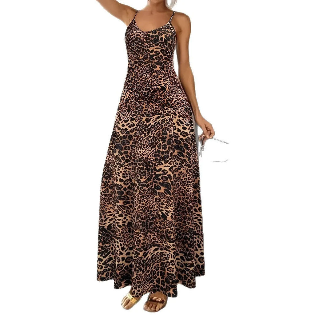 Dark brown leopard print sleeveless dress with round neck and sling straps, made from milk silk polyester fabric.