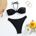 Black women's bikini set with lace-up tube top and matching briefs on white background