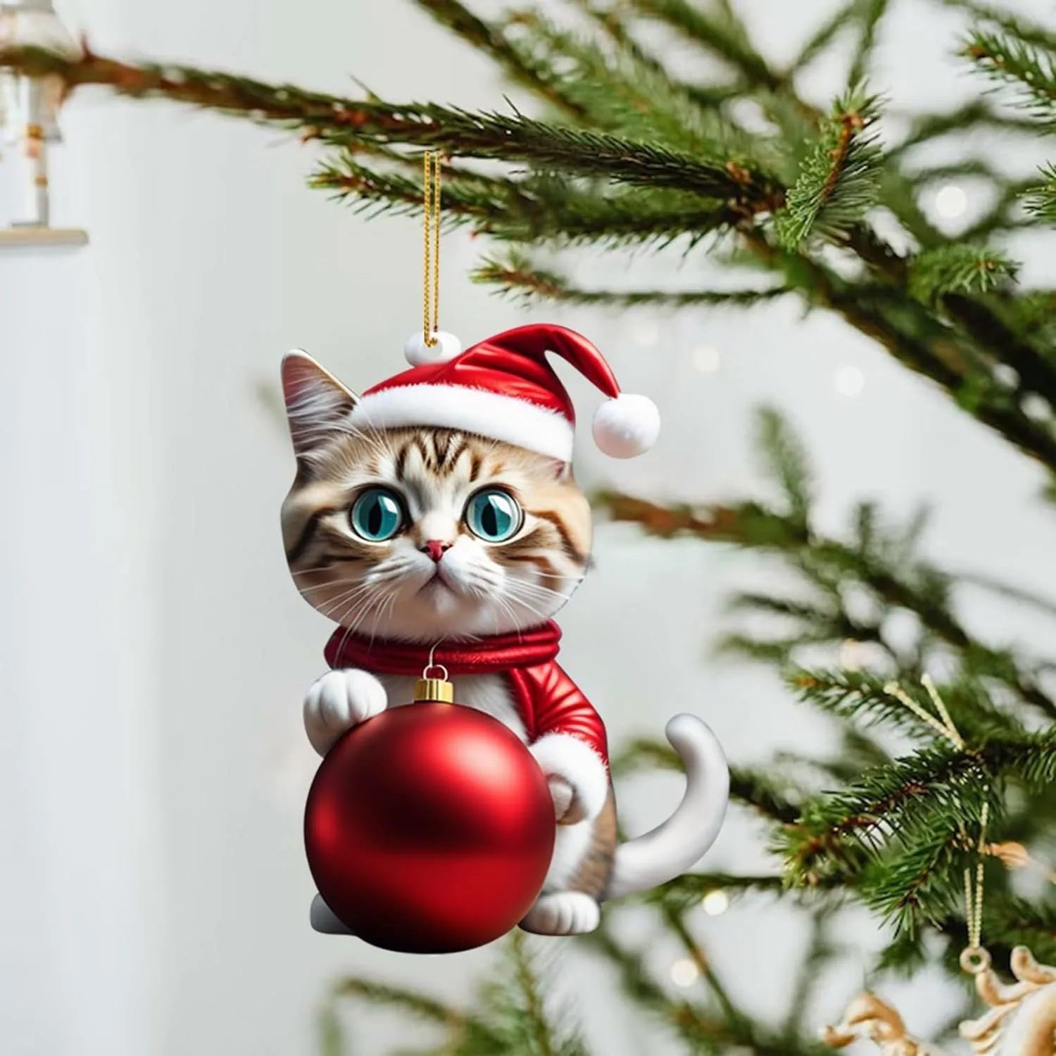 Cartoon style creative kitty Christmas ornament hanging in a car, made from clear acrylic.