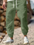 Men's straight-leg summer trousers in apricot colour with an elasticated waistband