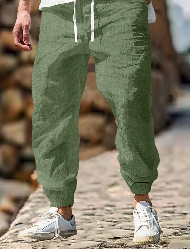 Men's straight-leg summer trousers in apricot colour with an elasticated waistband