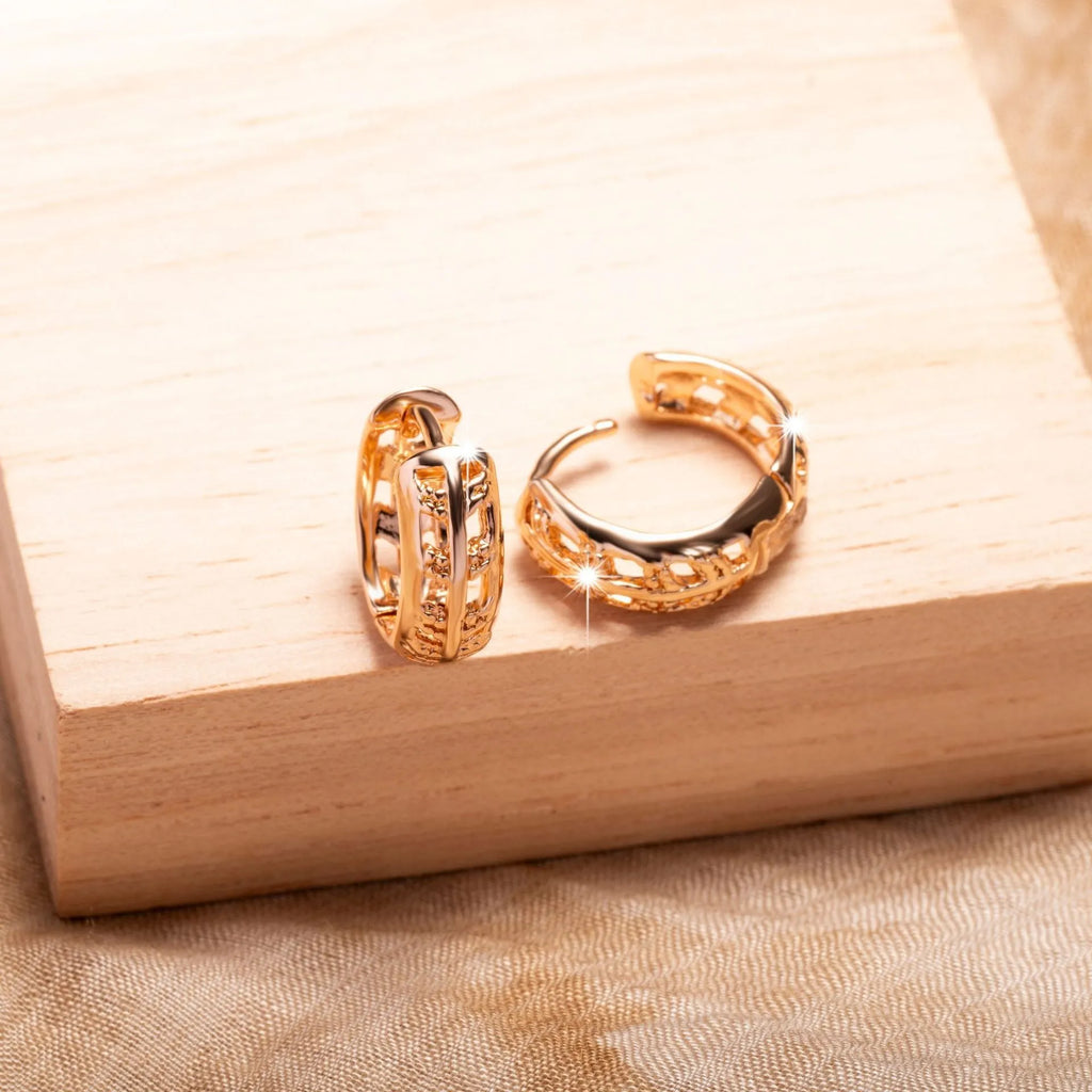 Copper earrings with rose gold finish featuring hollowed-out leaf and heart shapes
