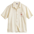 Light apricot men's Cuban collar shirt with bamboo plant pattern design