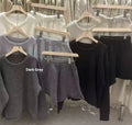 Women's knitted sweater and wide leg shorts two-piece set in neutral colours