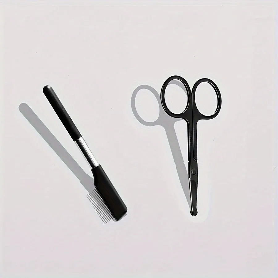 Black pet grooming brush with soft silicone bristles for gentle eye cleaning on dogs and cats