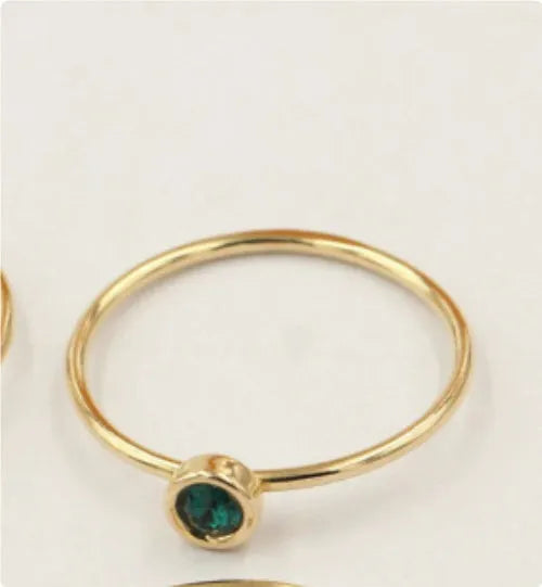 Women's 14K gilded copper zircon ring in green, blue, dark red, and white colour options.
