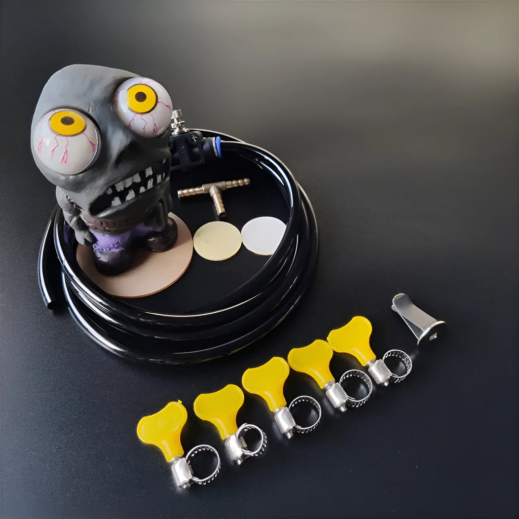 Turbo car decompress ornament kit showing rubber doll, pressure regulating valve, copper tubing, and installation clips