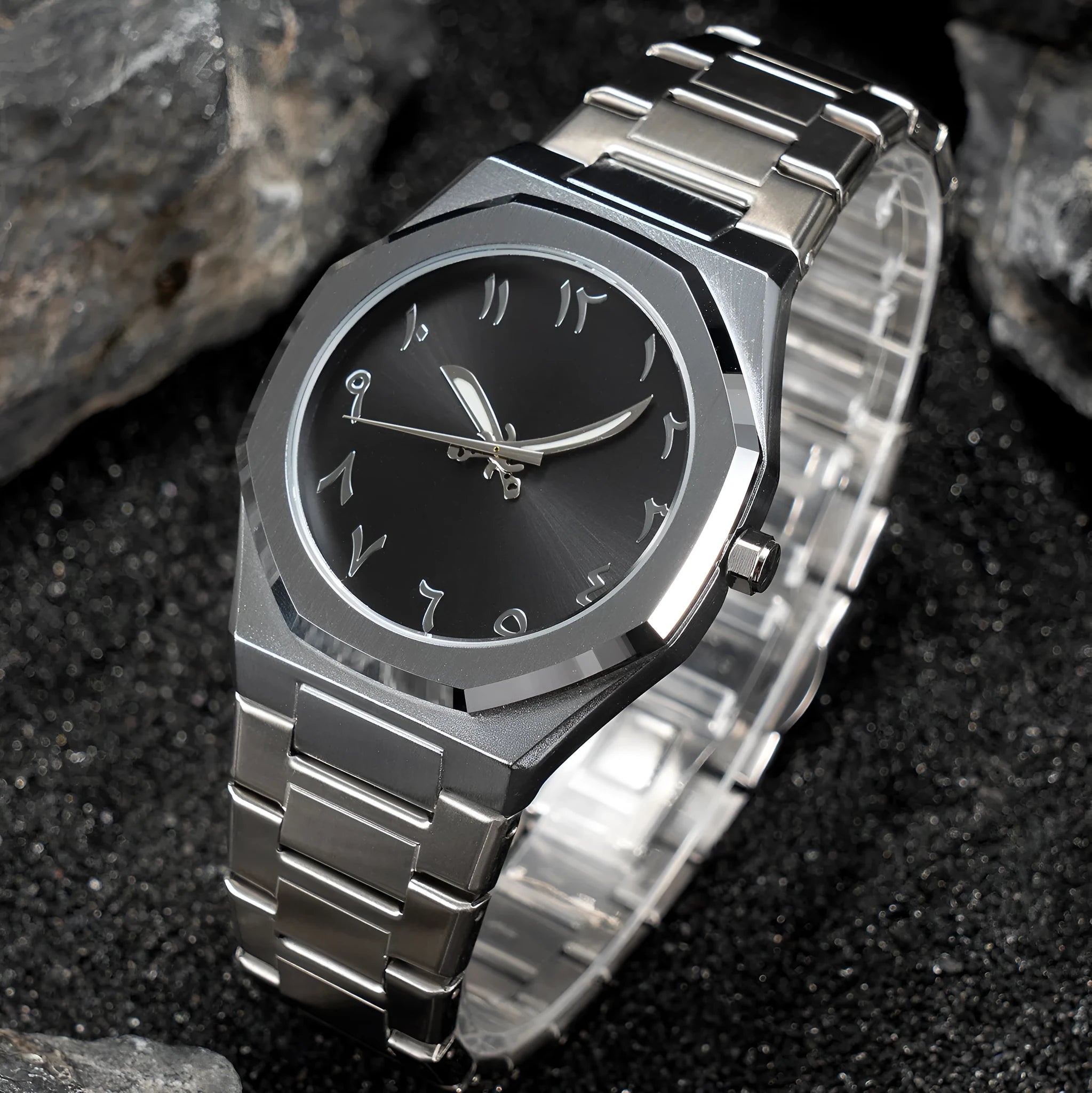 Men's business quartz watch with a steel bracelet and a black and silver dial on a wrist.