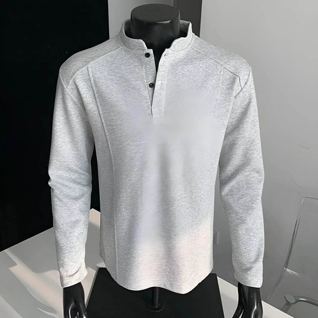 Men's long sleeve polo shirt with stand-up collar and asymmetric patchwork design in loose fitting style