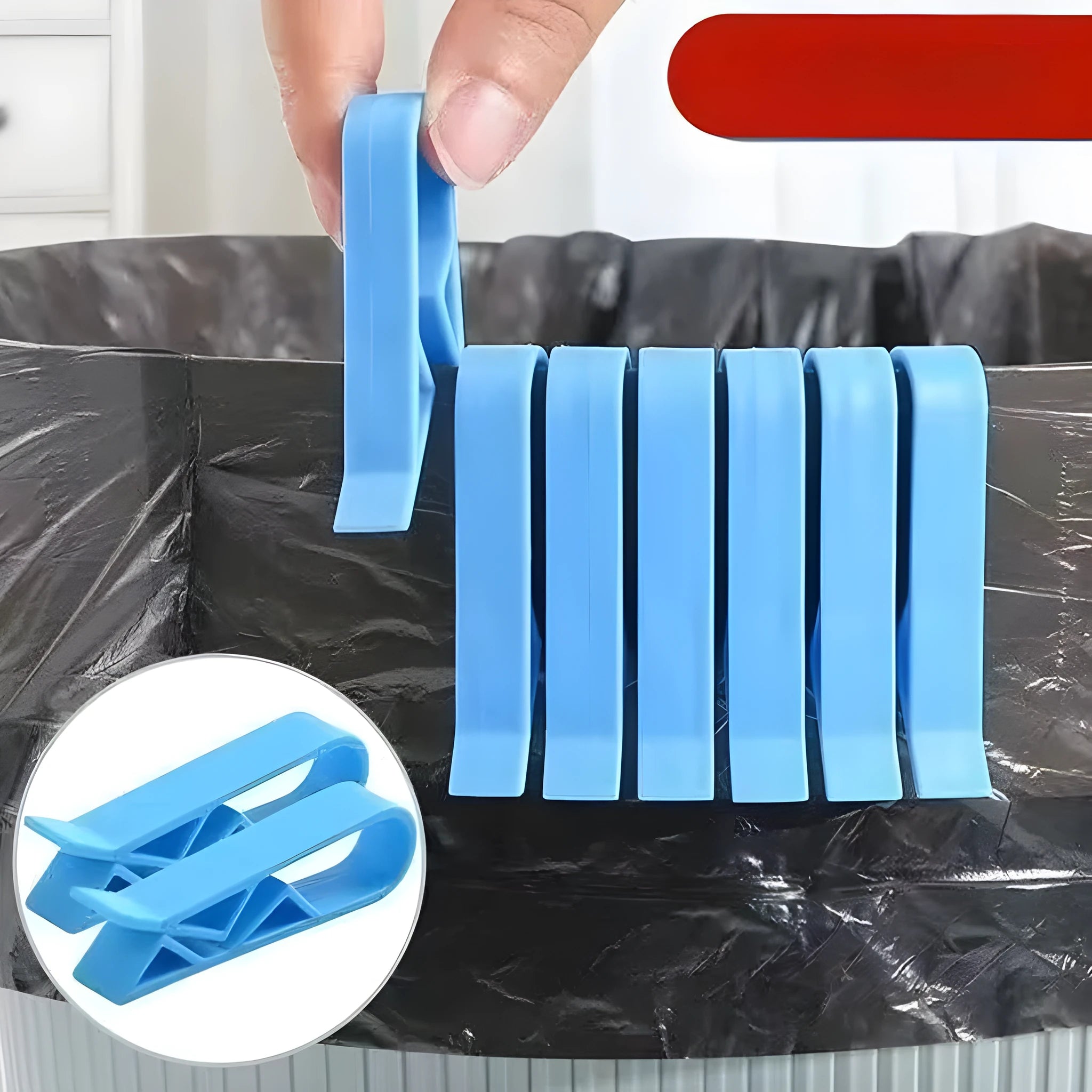 White PP plastic garbage bag fixing clip attached to the rim of a black indoor bin.