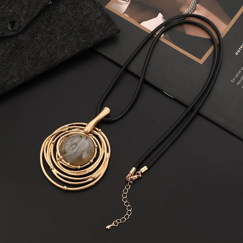 Vintage gold women's sweater chain necklace with geometric plaid pendant on snakeskin wax rope chain