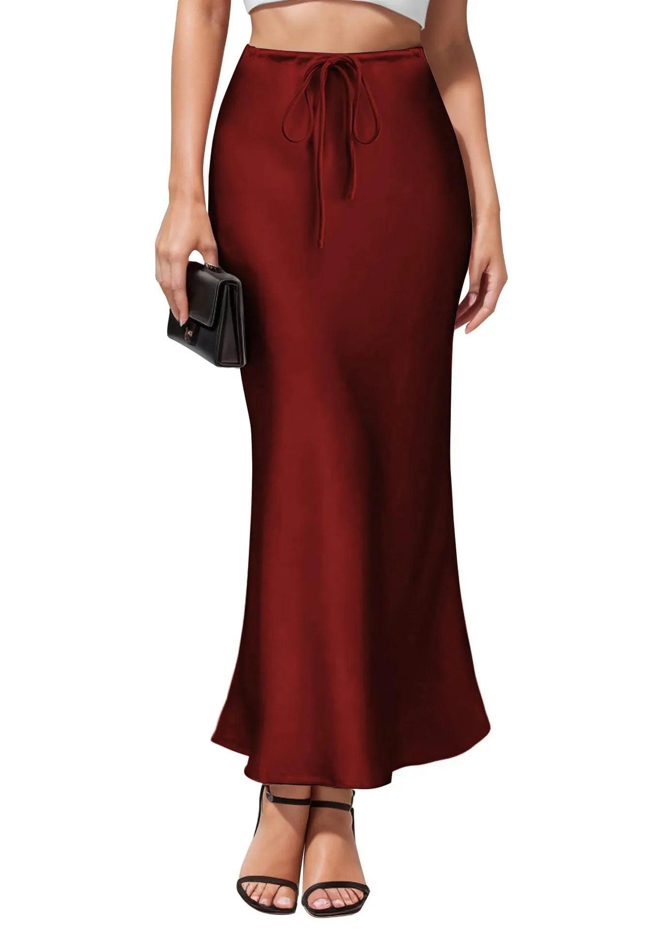 Women's high-waisted asymmetric acetate satin skirt in a solid colour with an irregular hemline.