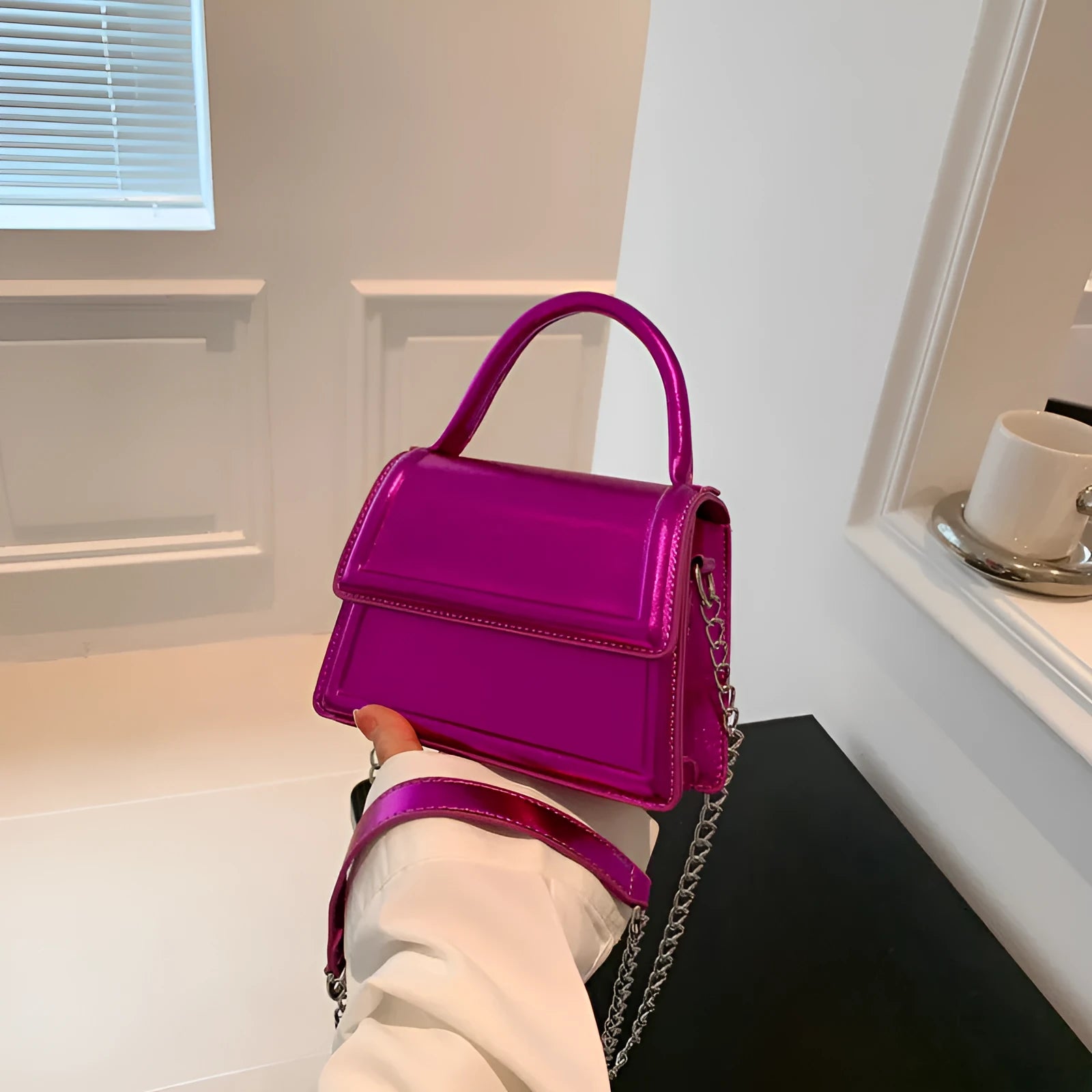 Square-shaped PU leather crossbody bag in multiple colour options on a model.
