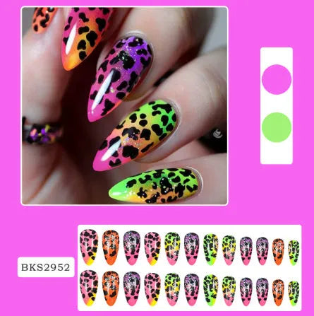 Four boxes of Armour brand frosted nail stickers showing almond-shaped designs in French leaves, leopard print, macaron, and plating patterns.