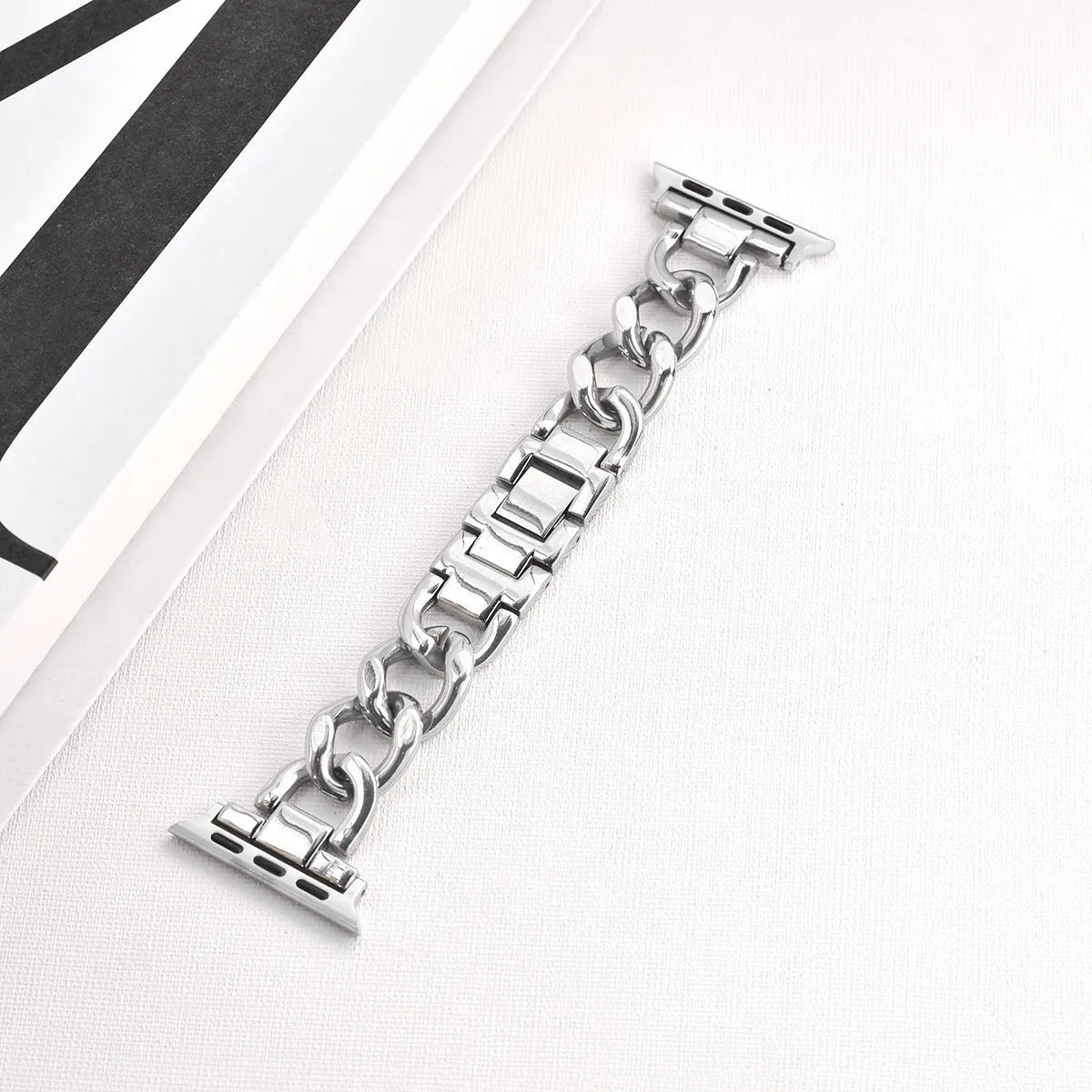 Silver metal chain strap for Apple Watch with 22mm connector on a watch case