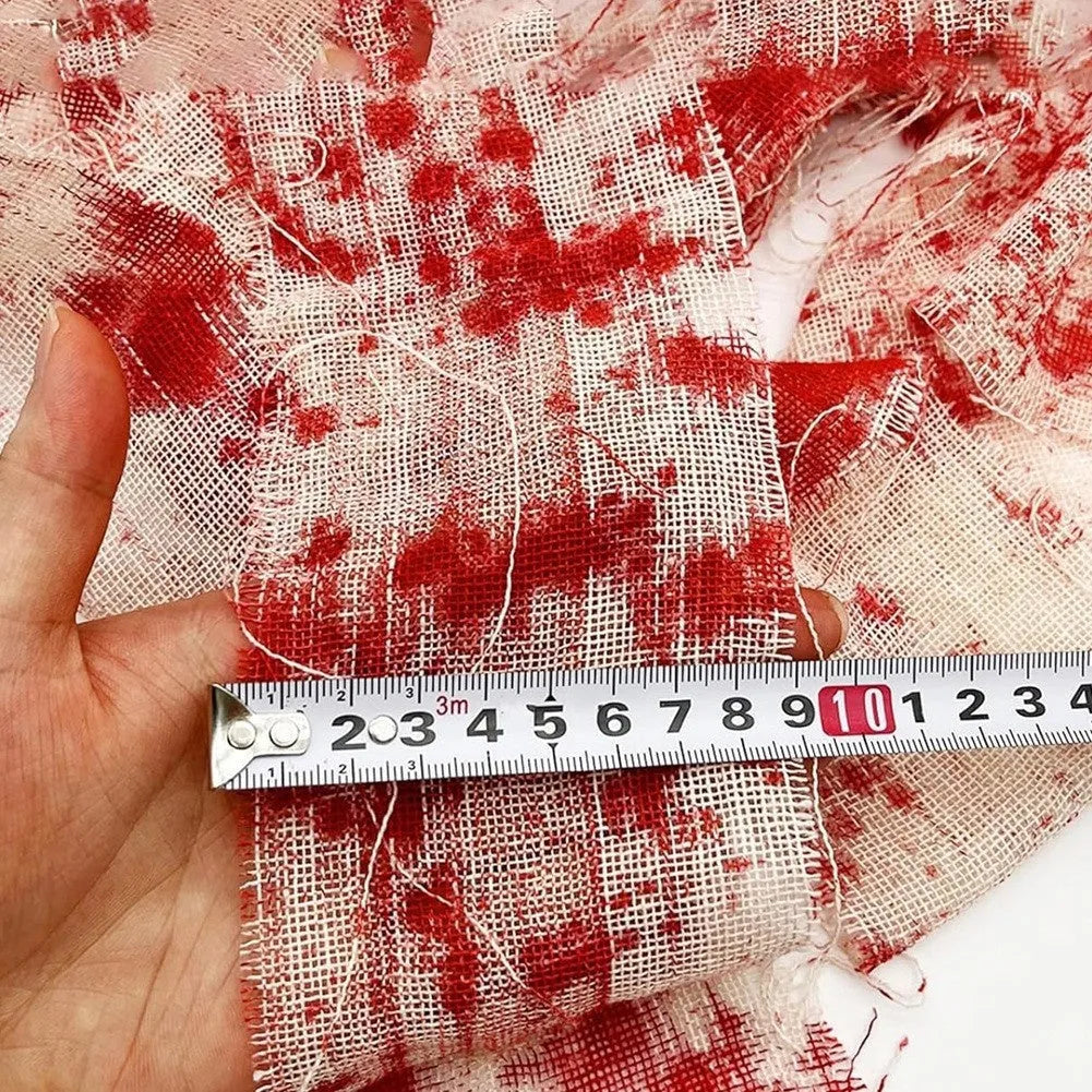 Blood red polyester Halloween bandage roll showing 8cm width, horror costume accessory for mummy wraps