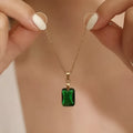 Copper geometric quadrilateral pendant necklace with O-ring chain in green colour.