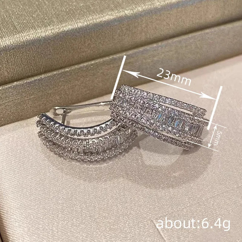 Geometric copper stud earrings with zircon inlay in white gold colour