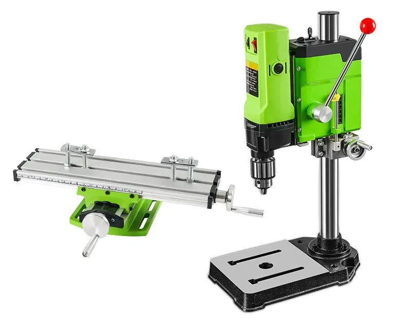 Mini bench drill and milling machine with heavy-duty cross bench pliers on workshop bench