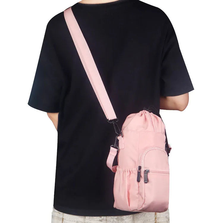 Cloth water bottle pouch with crossbody shoulder strap in black, green, and pink colour options.