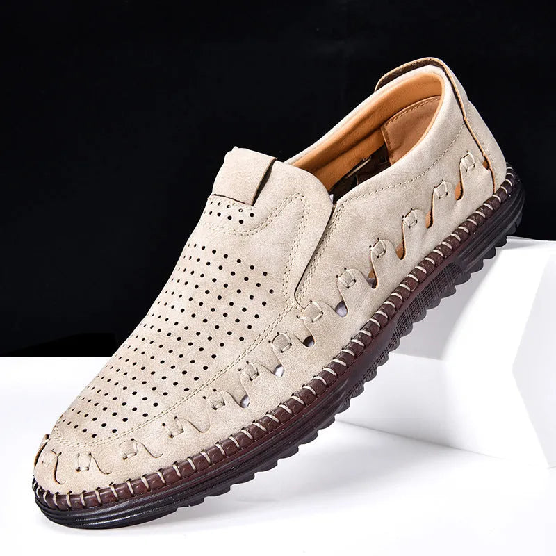 Men's brown slip-on casual leather shoes with round toe and flat PVC sole on a white background.