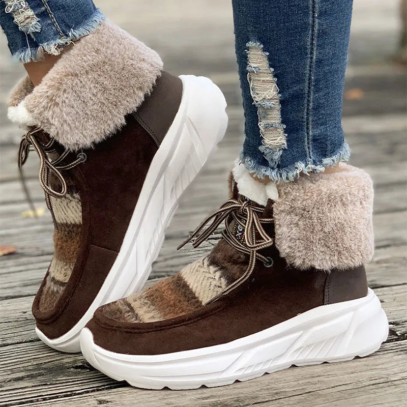 Beige women's lace-up mid-top snow boots with fuzzy lining and a thick rubber sole.