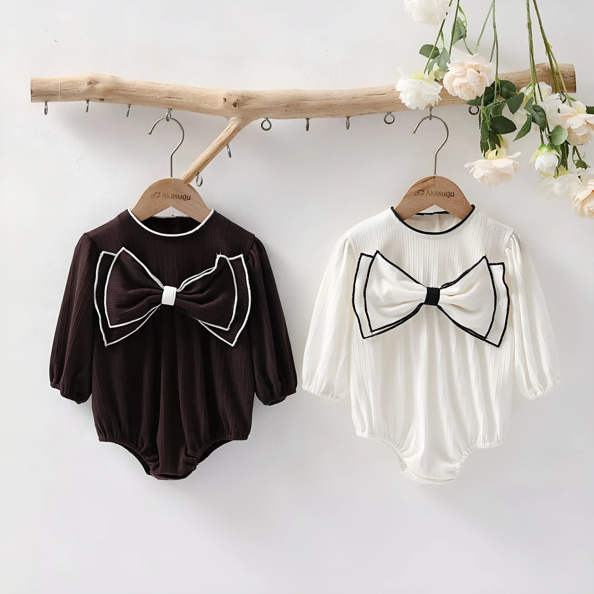 Baby girl long sleeve cotton onesie with bow detail in white triangle style
