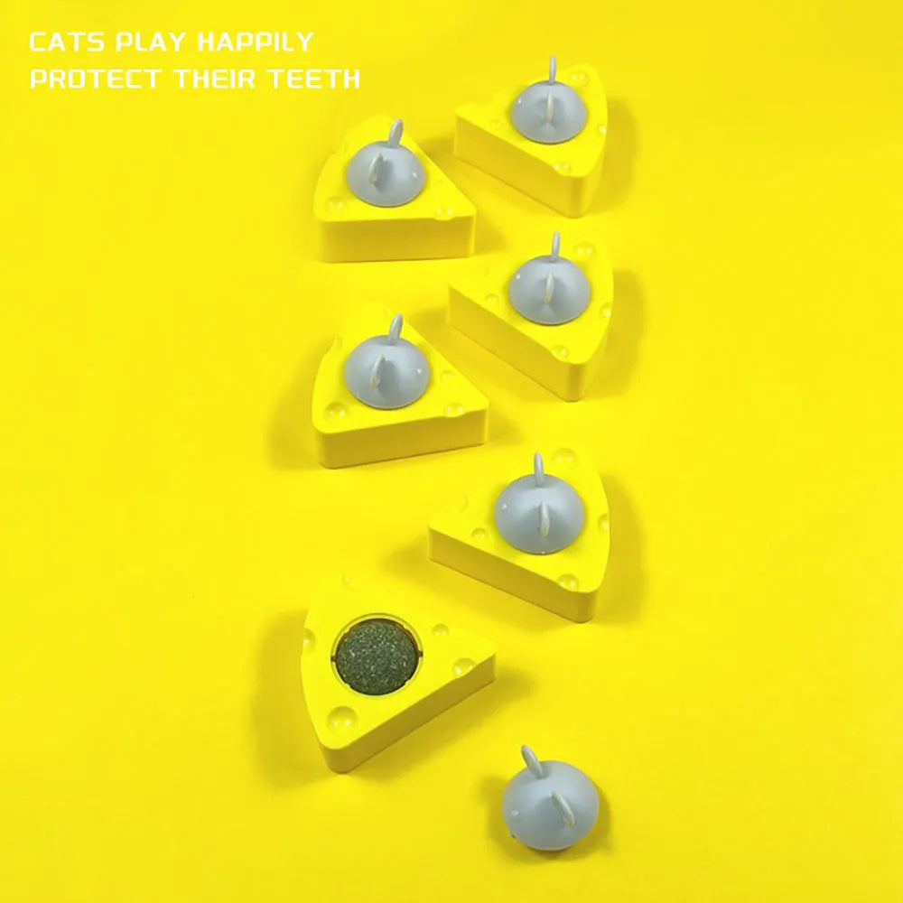 Yellow catnip toy balls for dental cleaning and feline entertainment
