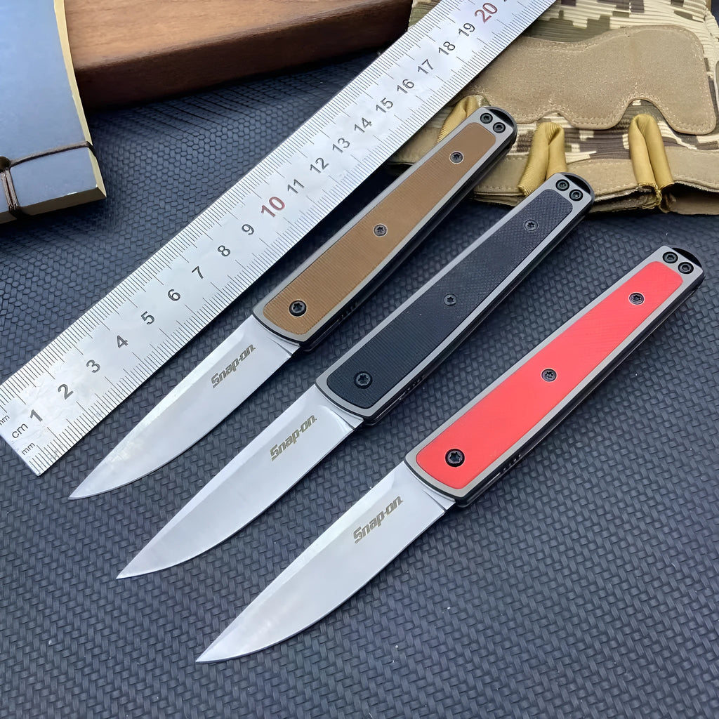 Folding fruit knife with stainless steel blade shown in open position with measurements