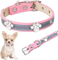 Reflective adjustable PU leather dog collar with paw rivet and metal buckle on a grey background.