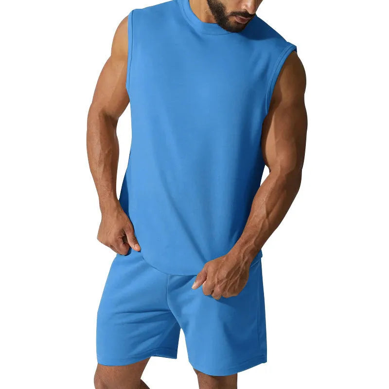 Men's sleeveless cotton-blend sports suit showing matching T-shirt top and shorts in a solid colour.
