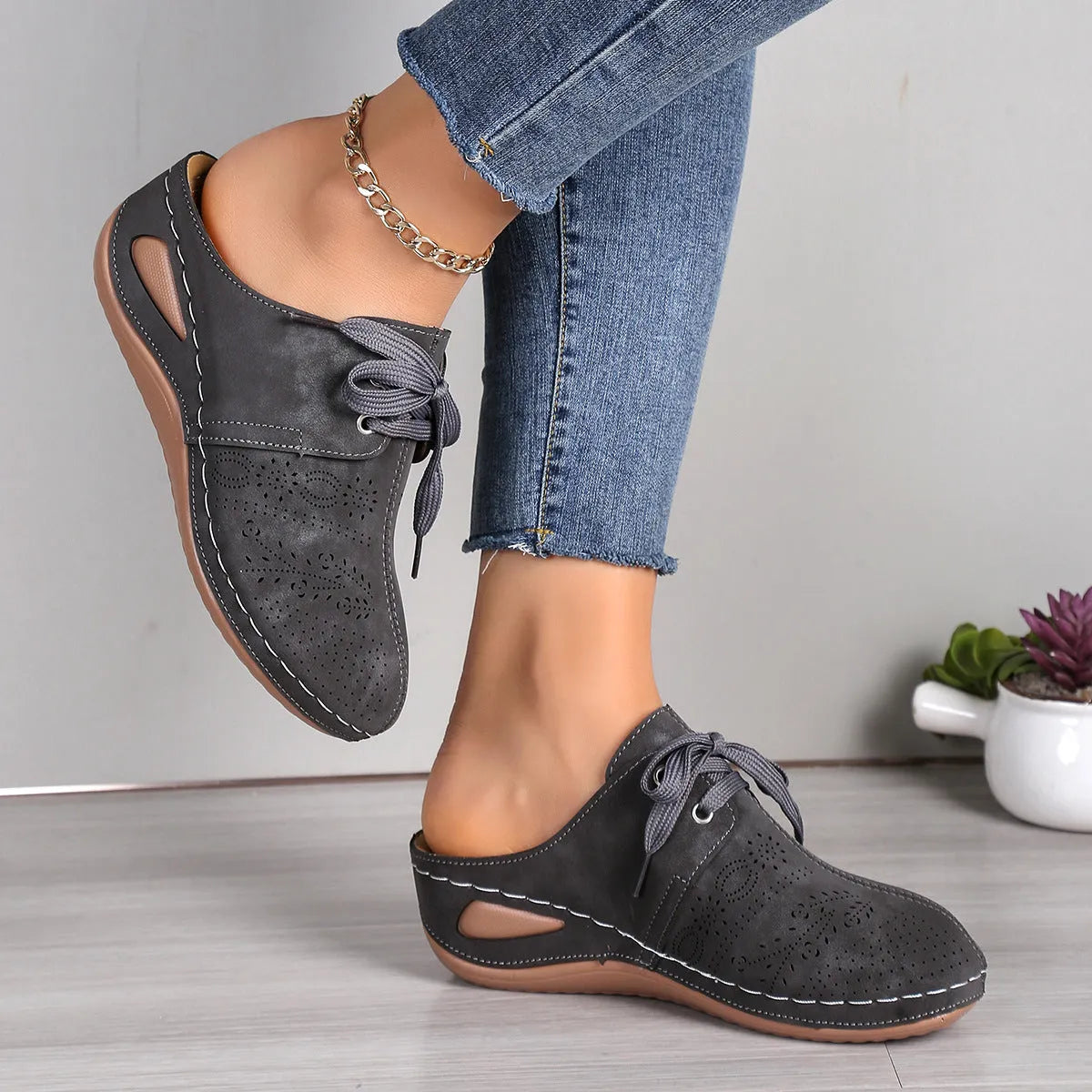 Women's summer wedge slippers with suede upper, lace-up design, and rubber sole in light grey.