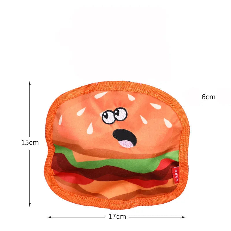 Food-themed crinkle squeaky dog toys in burger, fries, hot dog, and pizza designs for interactive play