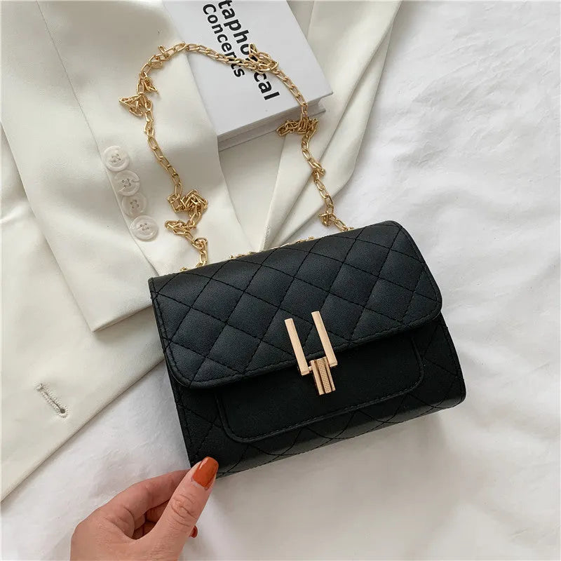 Women's minimalist crossbody bag with diamond lattice chain detail in black, white or green