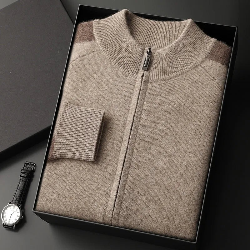 Man wearing a camel-coloured cashmere blend half turtleneck zip cardigan and matching trousers.