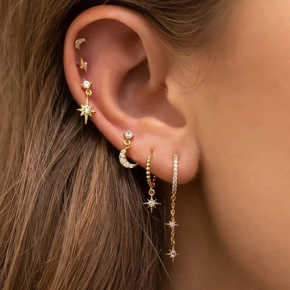 XINGX gold electroplated chain tassel earrings set with six pieces showing zircon stud details on copper earrings