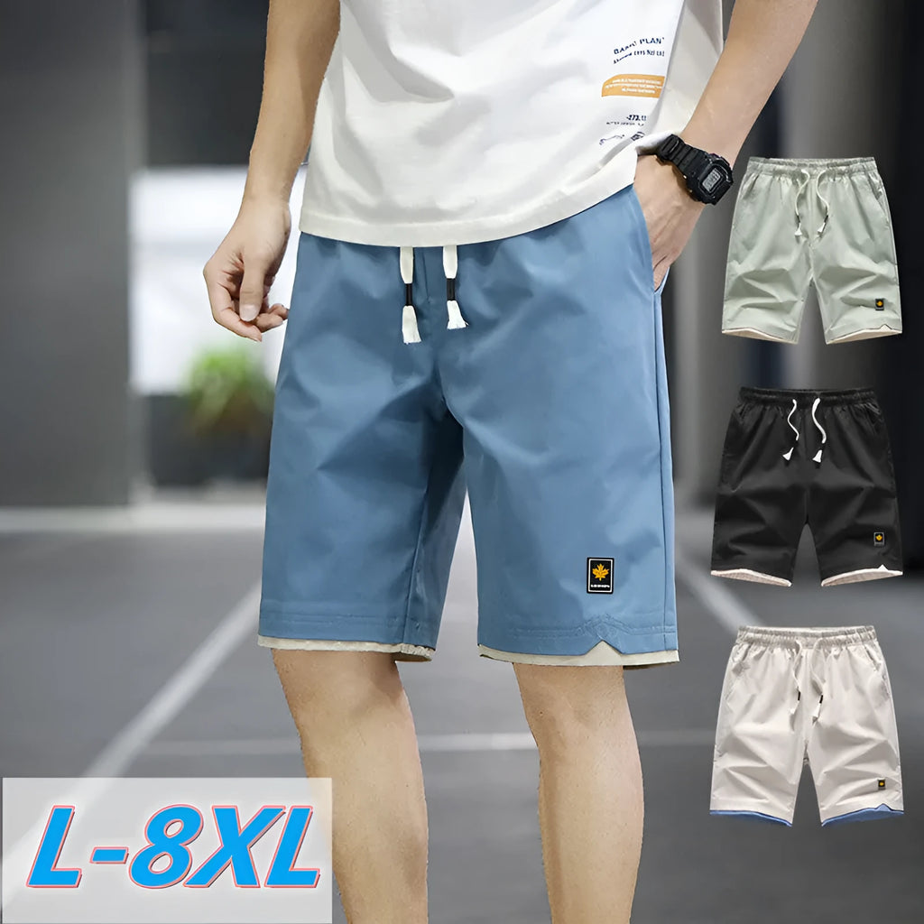 Loose straight-leg polyester beach shorts with elastic waist in multiple colour options