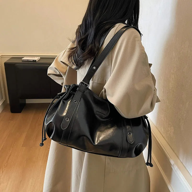 Women's soft PU crossbody underarm bag in horizontal square shape, measuring 48x13x20 cm, available in black, brown, coffee colours.