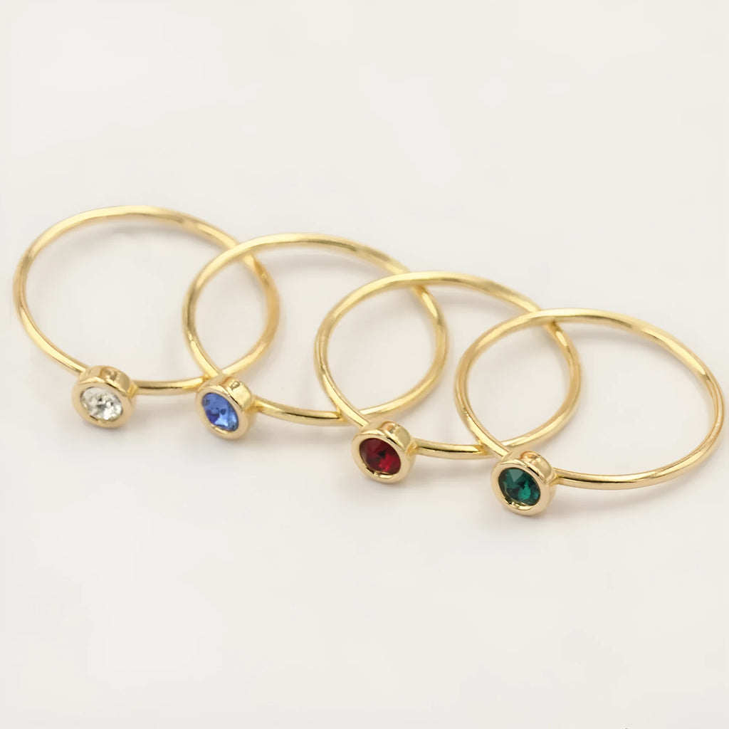Women's 14K gilded copper zircon ring in green, blue, dark red, and white colour options.