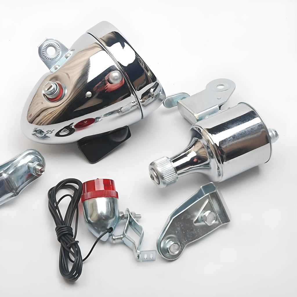 Silver bicycle dynamo light kit for front fork mounting with friction generator