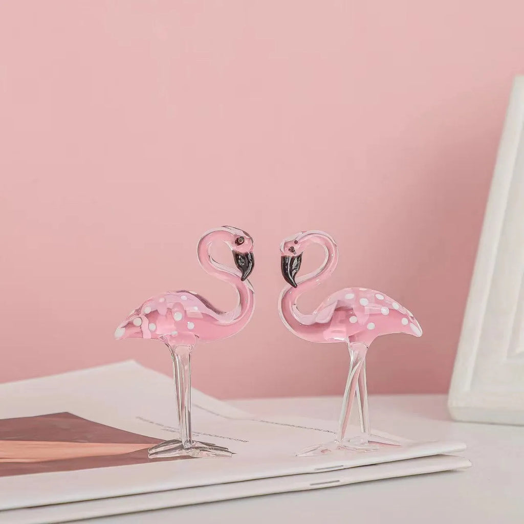 Pink crystal flamingo decorative animal figure on table with modern minimalist style