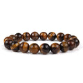 Tigereye crystal bead bracelet showing geometric round beads on a wrist.