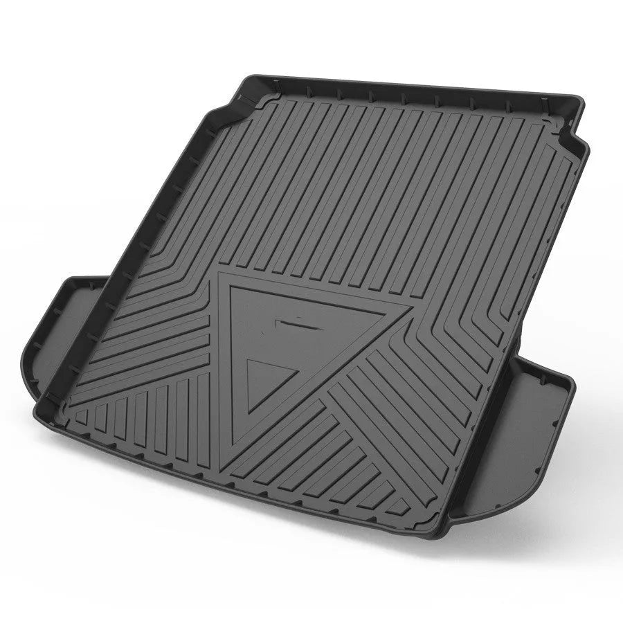 Black TPE car trunk pad with carbon fibre pattern installed in vehicle tailbox