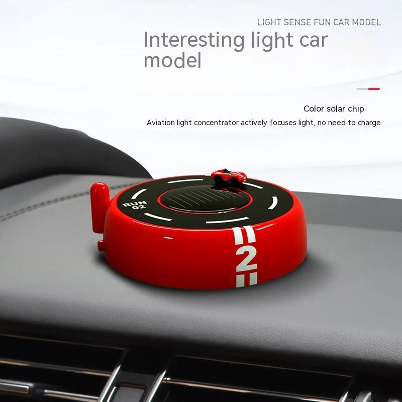 Round car-shaped solar-powered aromatherapy decoration in black colour with modern design