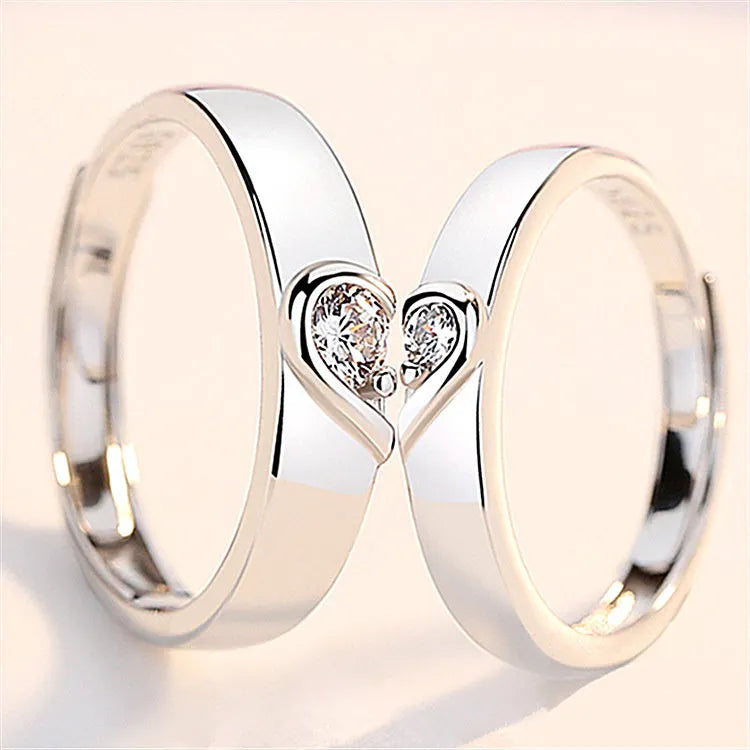 Heart-shaped diamond ring on finger, copper electroplate finish, couples wedding engagement style