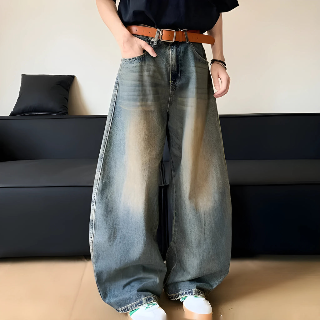 Men's retro blue distressed denim jeans with wide-leg cut and micro elasticity fabric