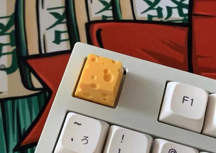 Yellow resin cheese-themed keycap for mechanical keyboards with detailed sculpting