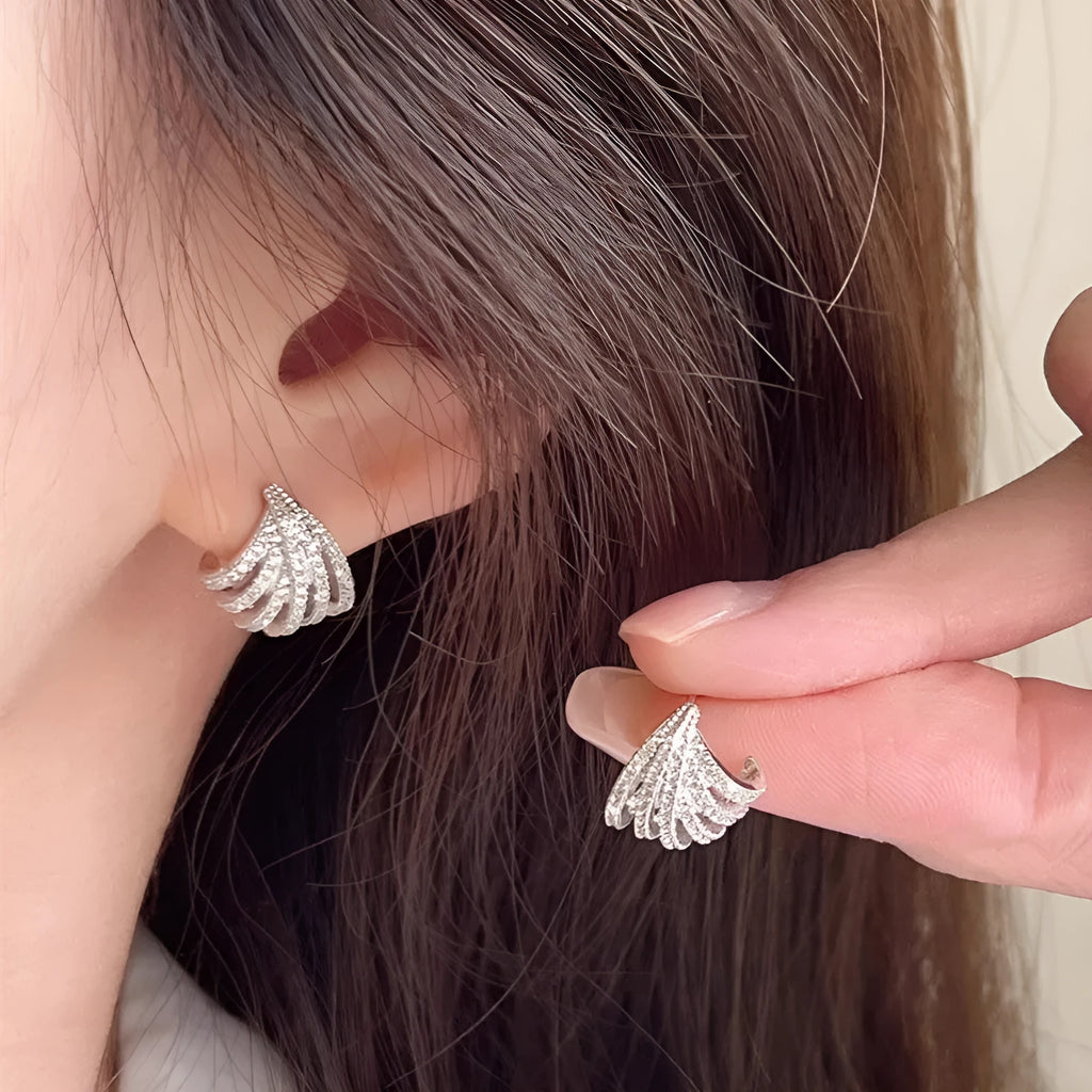 Geometric zircon earrings with platinum electroplating and line design